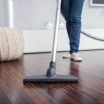 vacuuming a hardwood floor