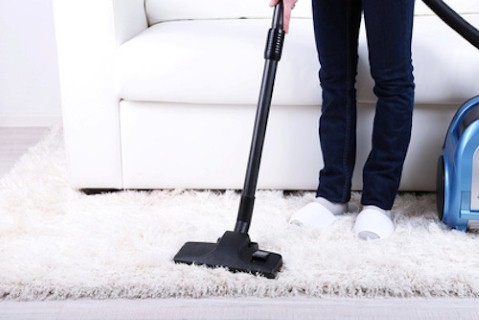 Cleaning home with vacuum cleaner